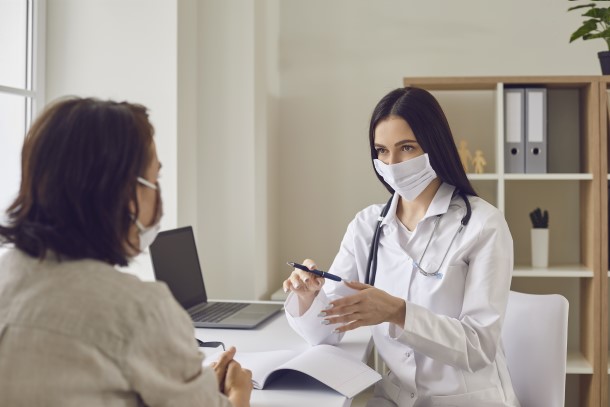 Doctor speaking with a patient