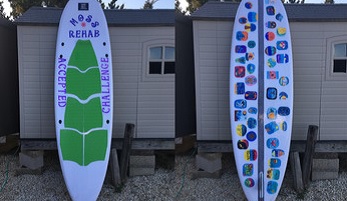Two MossRehab surf boards